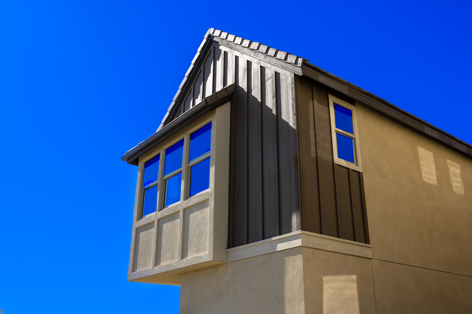 Residential building front seen from below.