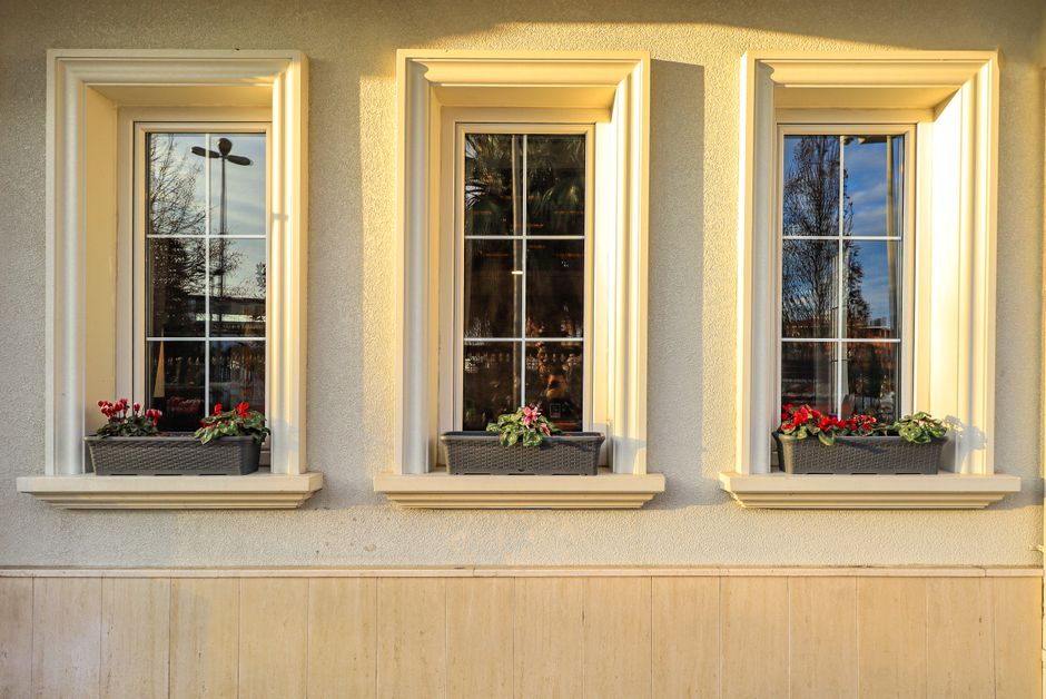 Building front with three windows.